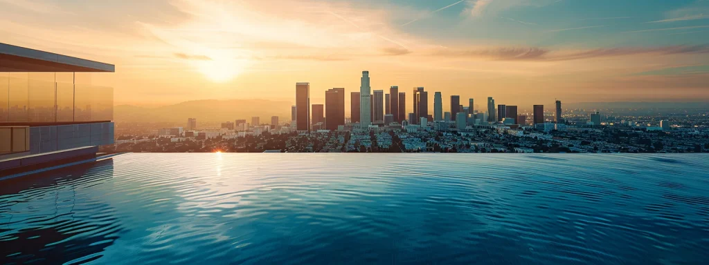 a sleek modern luxury home with a stunning infinity pool overlooking the los angeles city skyline.